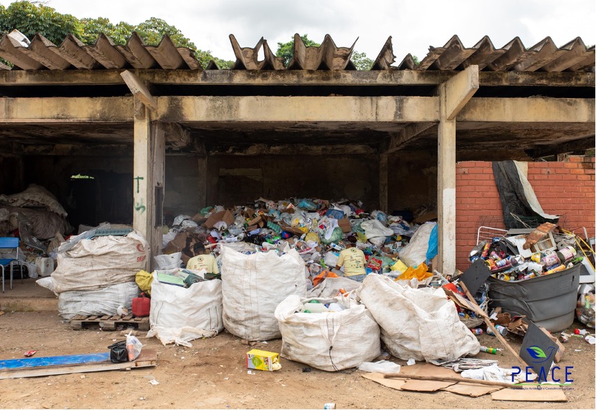 Image of a site filled with garbage and discarded items. 