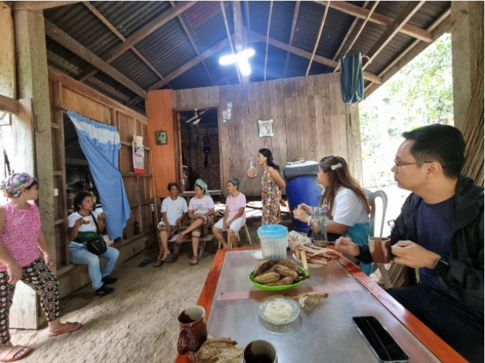 man women village food discussion